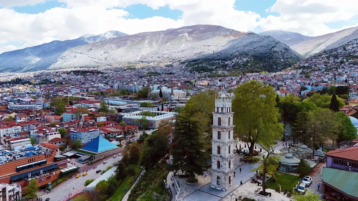 Bursa Tophane Parkı havadan panoramik şehir ve Uludağ manzarası